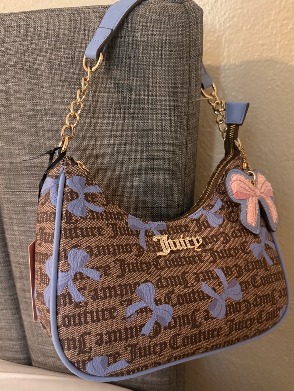 Juicy Couture Brown Monogram Shoulder Bag with Blue Bow Accents